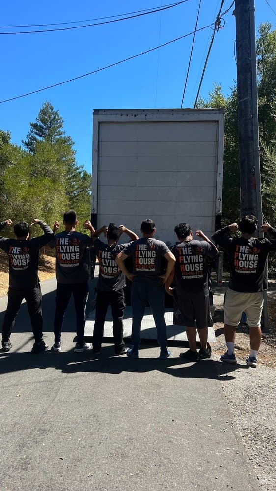 The Flying House moving crew at the truck